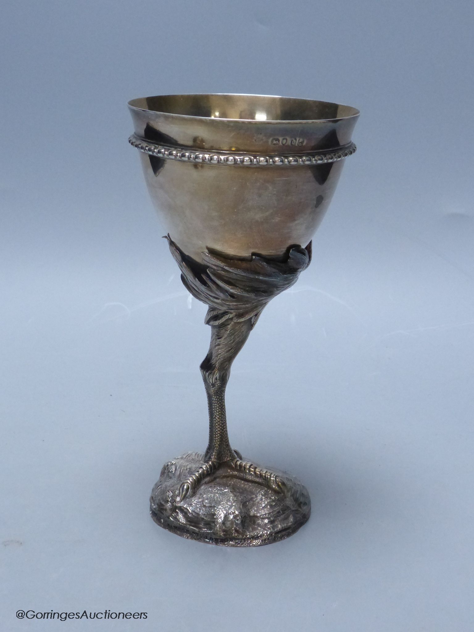 A Victorian silver goblet, the removable stem modelled as the leg of an ostrich, Robert Garrard II, London, 1859, 19.1cm, 10oz.